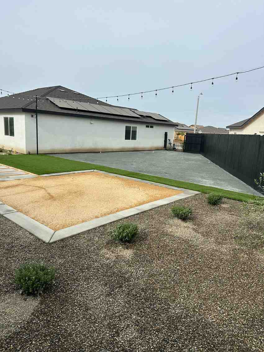 Finished backyard landscaping with lawn